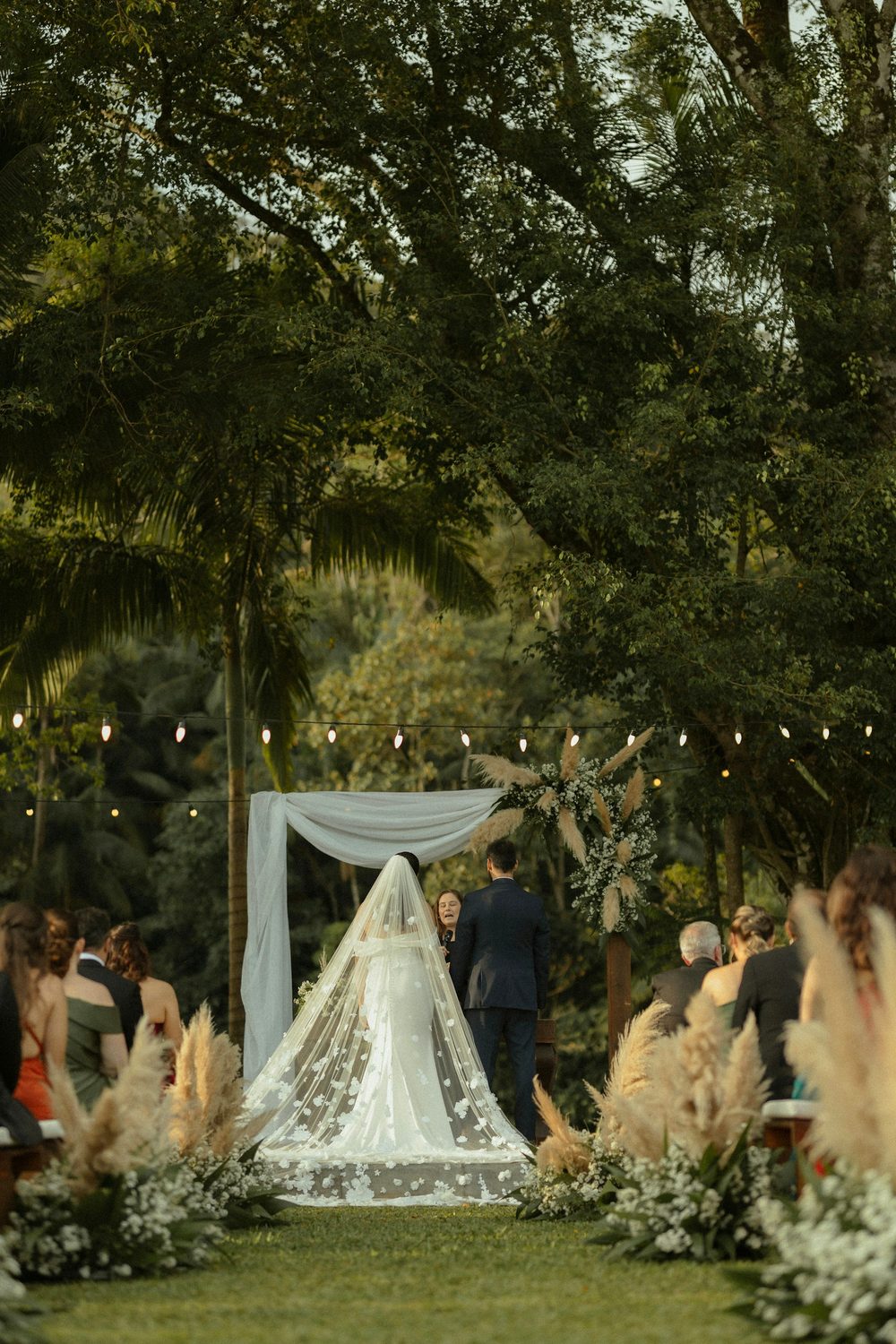 An outdoor garden wedding ceremony